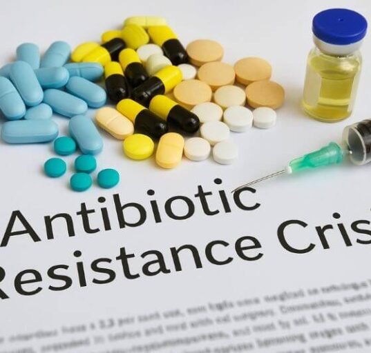 Visual representation of antibiotic resistance crisis with resistant bacteria and medical vials