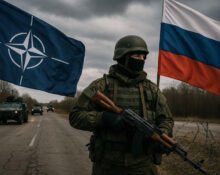 Image showing Russian soldier near a NATO border checkpoint with tanks and warning signs, symbolizing the rising Russia-NATO conflict in Eastern Europe
