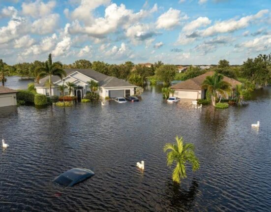 Flooding in Florida submerging homes, streets, and vehicles